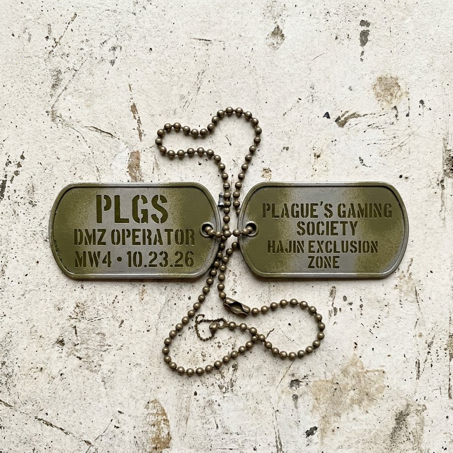 Military dog tags stamped PLGS, DMZ Operator, MW4 10.23.26